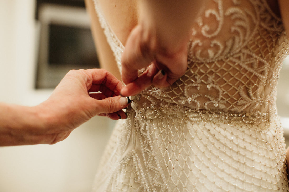 Sophie Gown | Illusion high neckline on a trumpet silhouette, with textured lining and ornate beading