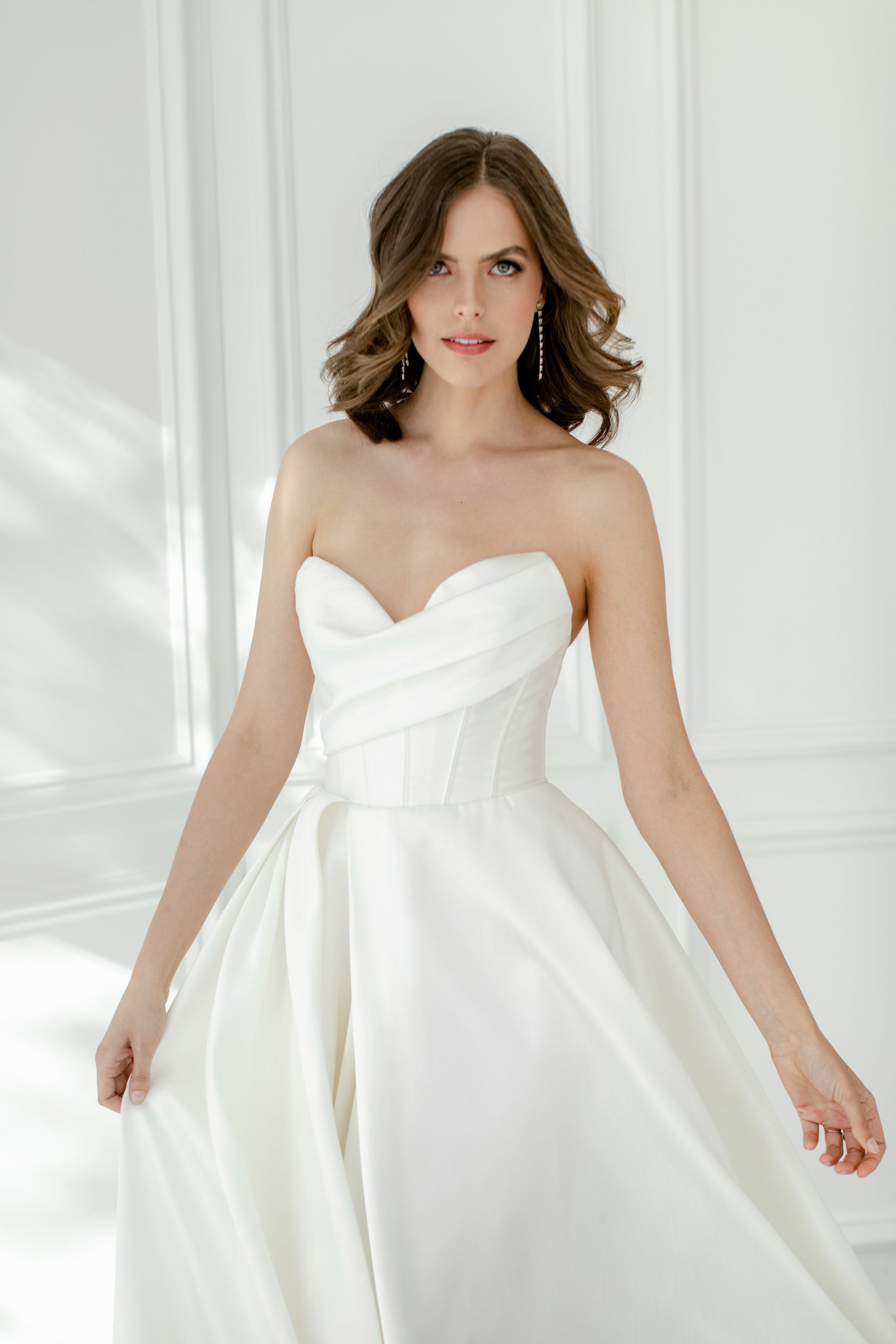 Strapless Ball Gown Wedding Dress With A Corset Bodice, Front Slit And Back  Bow